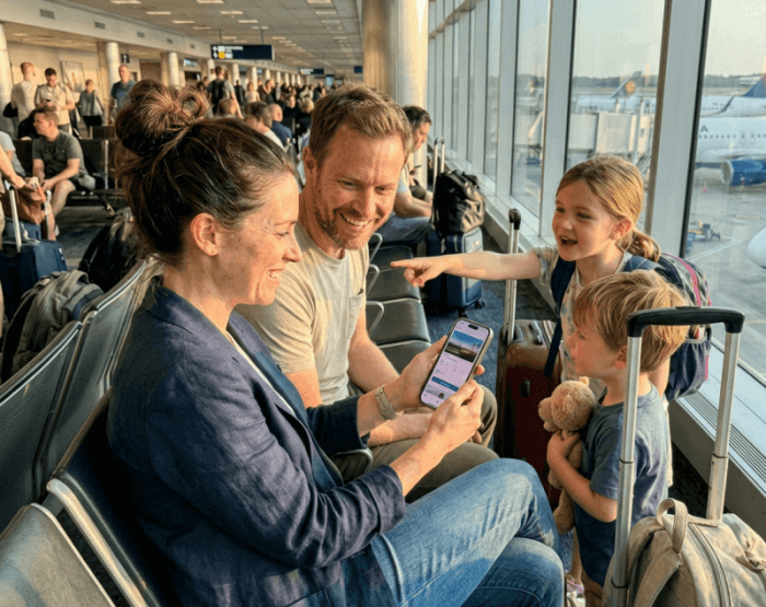 Sarah and her family at the airport gate, ready to board their Business Class flight to Rome